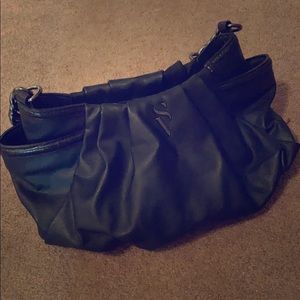 A black leather purse